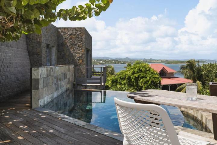 Appartement de vacances pour 2 personnes, avec terrasse ainsi que vue et piscine