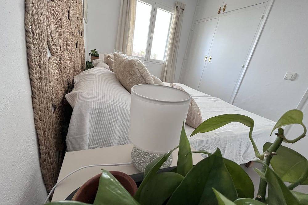 Bohemian villa, sea view, beach 100 m away, 2 bedrooms, air conditioning in Punta Prima, Sant Lluís