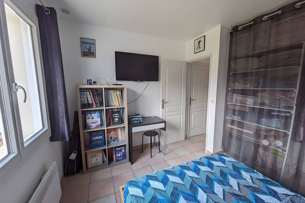 Habitaciones de huéspedes con jardín en casa de Aurore y Laurent in Montarnaud, Región de Lodève