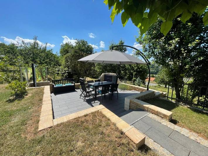 Ferienwohnung für 3 Personen, mit Terrasse und Garten sowie Ausblick