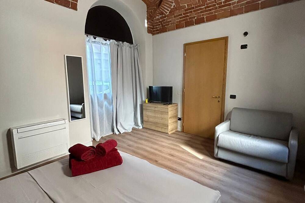 Appartement entier, Apartment with parking space located in the heart of the historic center in Alba (Piemont), Langhe