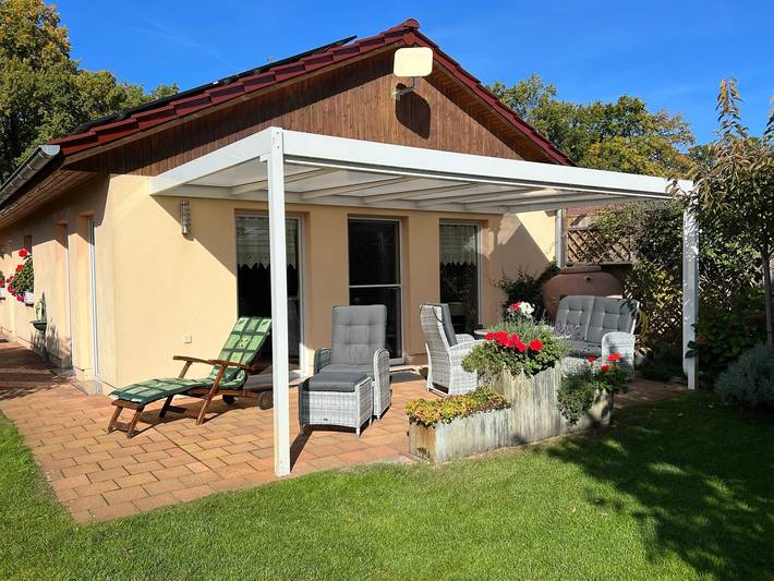 Ferienhaus 'Ferienhaus 75 Qm, 1 Schlafzimmer' mit privater Terrasse, Gemeinschaftsgarten und Wlan in Neuruppin, Ruppiner Seenland