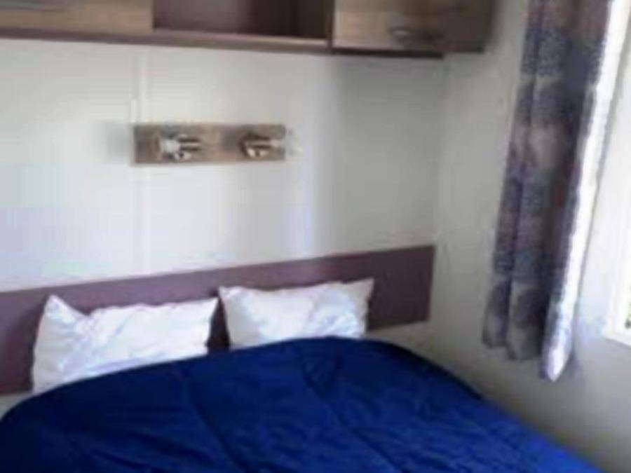 Flower Camping du Lac de la Seigneurie - Mobile home 4 persons - Soléo Confort 26M² (2 Bedrooms) + Covered Terrace 9m². in Leval, Territoire-de-Belfort