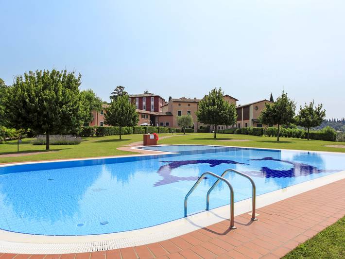 Location de vacances pour 5 personnes, avec Terrasse ainsi que Jardin et Bassin pour enfant à Costermano
