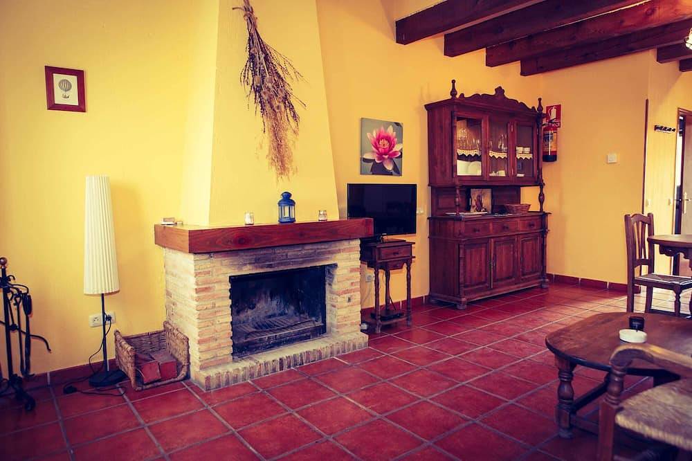 In the house the Corco you can enjoy a terrace with barbecue and front yard in Horcajuelo de la Sierra, Madrid Province