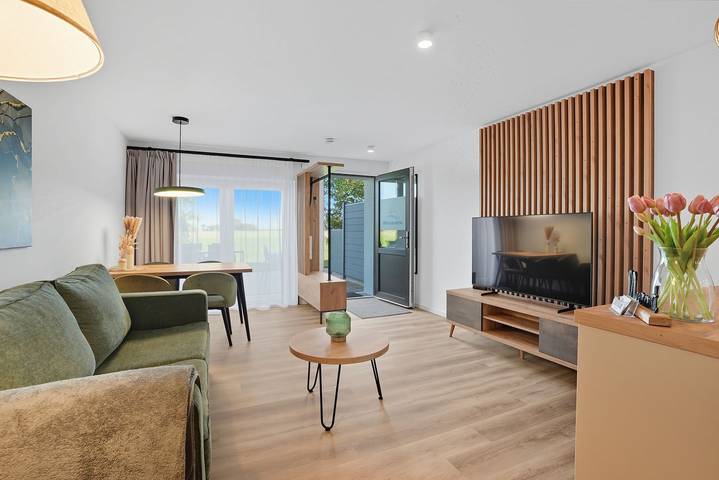 Ferienwohnung für 5 Personen, mit Balkon und Terrasse sowie Ausblick in Carolinensiel