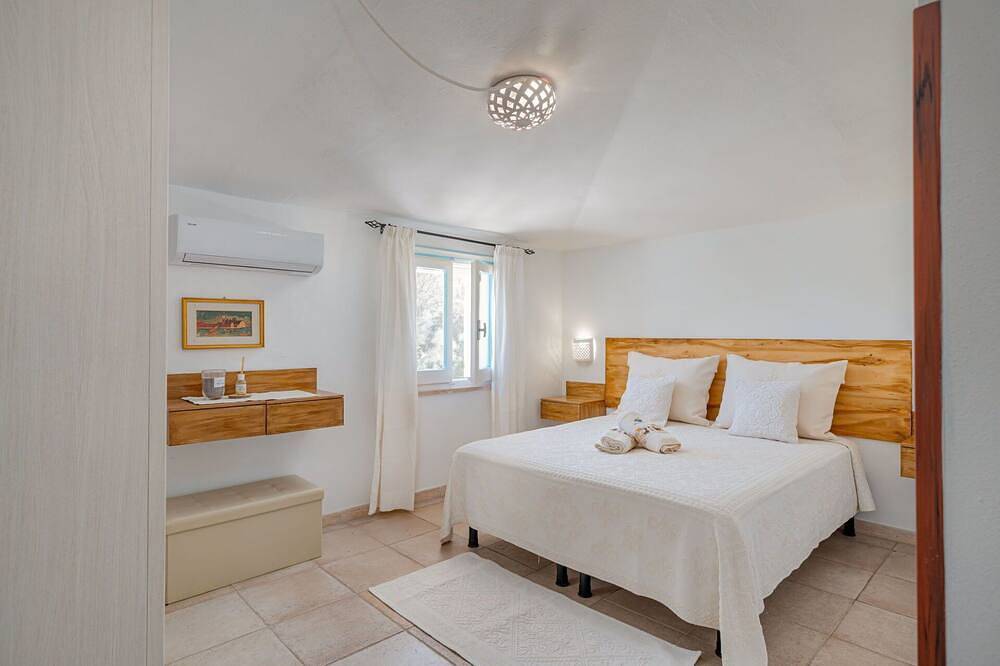 Wohnung in einem Ferienhaus mit Pool, Klimaanlage,  W-Lan, Tv, Innenhof, Haustiere erlaubt in Eden Beach, Sorso