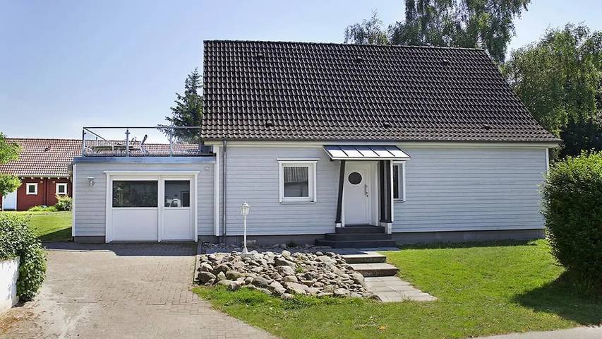 Ferienhaus für 4 Personen, mit Balkon und Terrasse sowie Garten und Sauna