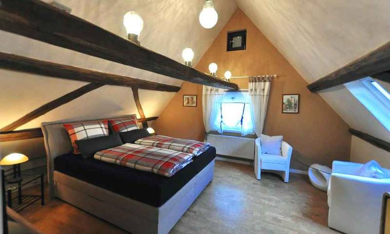 Ferienhaus für 4 Personen, mit Balkon und Garten