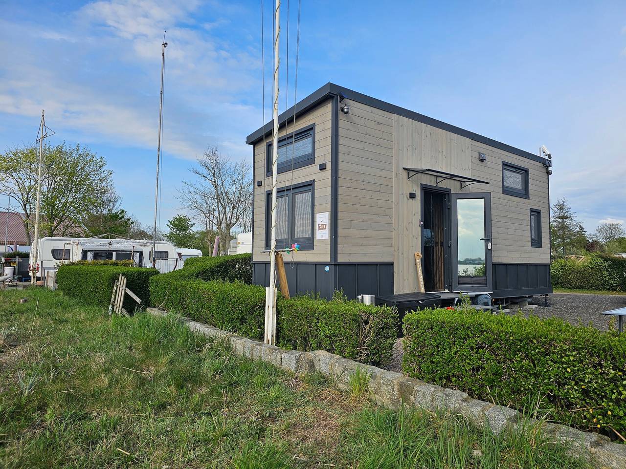 Appartement de vacances entier, Tiny House « Ingo John Vanessa » avec vue sur mer, Wi-Fi et climatisation in Hagen im Bremischen, Südliches Cuxland