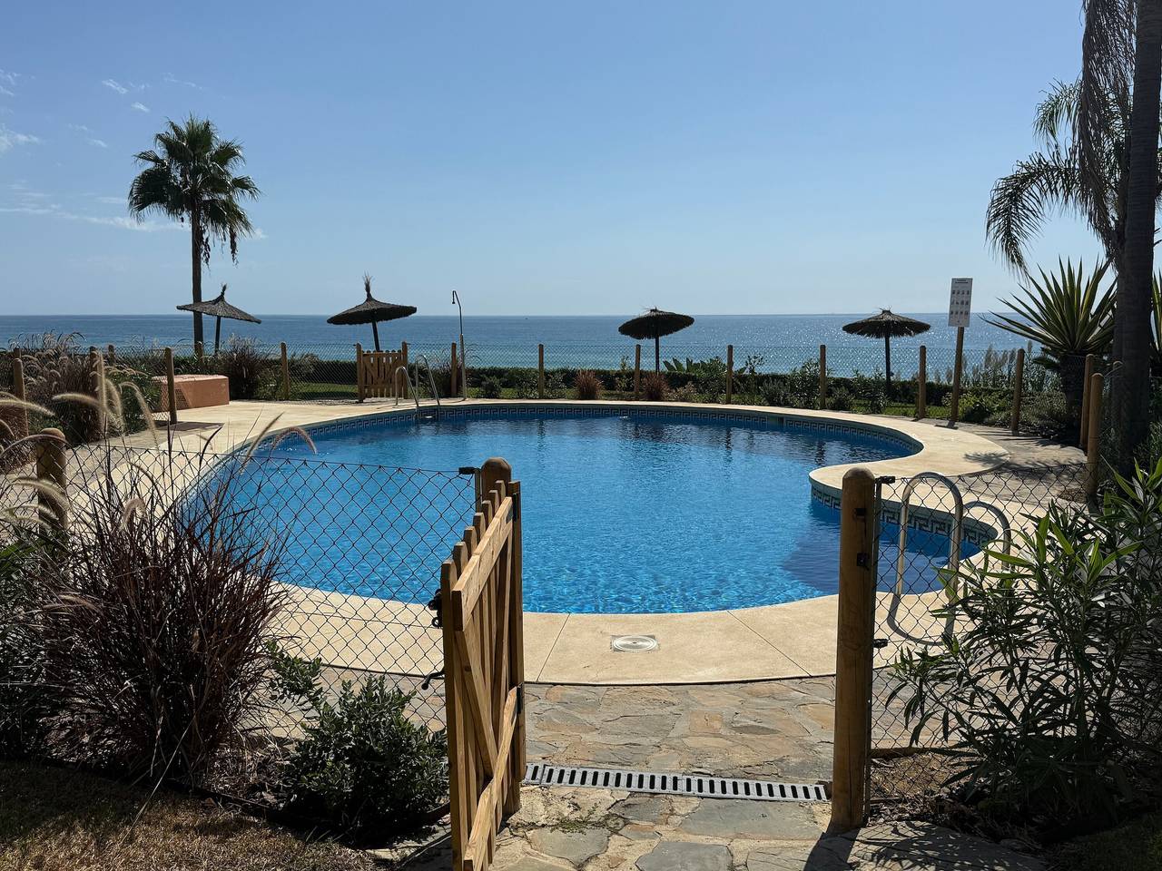 Casa Vacacional en Primera Línea de Playa con Wi-Fi y Aire Acondicionado