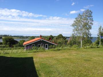 Ferienhaus für 4 Personen, mit Garten und Seeblick sowie Sauna in Kosel