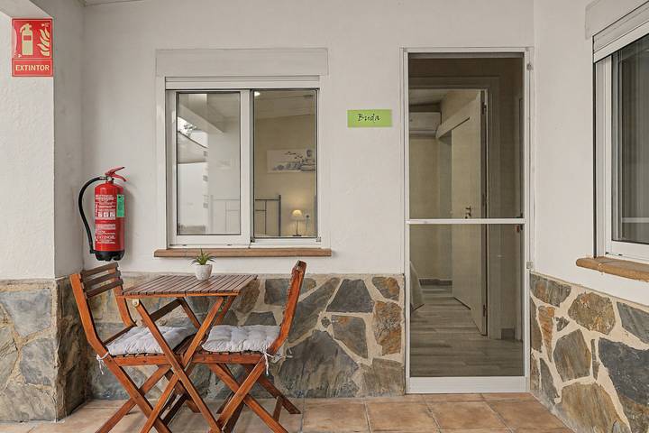 Apartamento entero, Habitación 'Buda' con terraza compartida, Wi-Fi y aire acondicionado in el Poblenou del Delta, Amposta