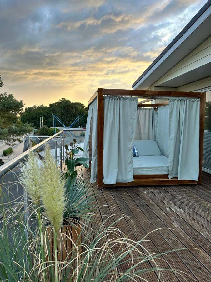 Ferienwohnung für 6 Personen, mit Terrasse und Garten sowie Seeblick und Ausblick