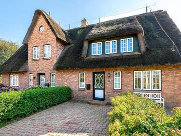 Ferienhaus mit Meerblick für 4 Personen, mit Terrasse und Garten sowie Sauna auf Föhr