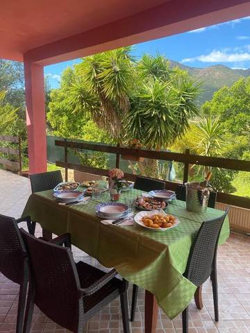 Location de vacances pour 7 personnes, avec vue et jardin dans Portixeddu