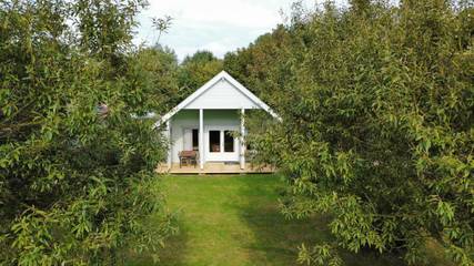 Ferienanlage für 6 Personen, mit Terrasse und Garten sowie Ausblick in Friesland