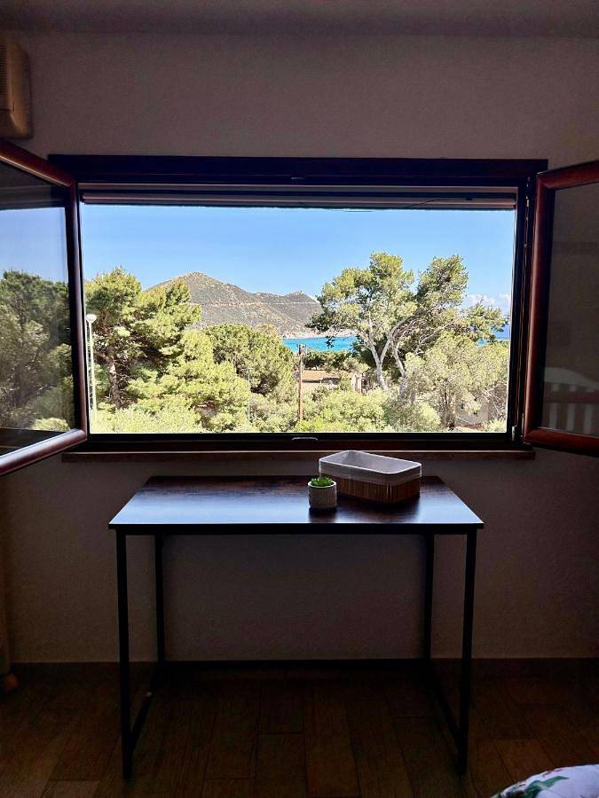 Casa vacanza per 8 persone, con Terrazza e Giardino nonché Panorama a Solanas