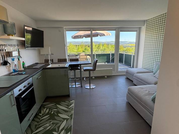 Ferienwohnung für 3 Personen, mit Balkon und Terrasse sowie Garten und Seeblick in Kell am See