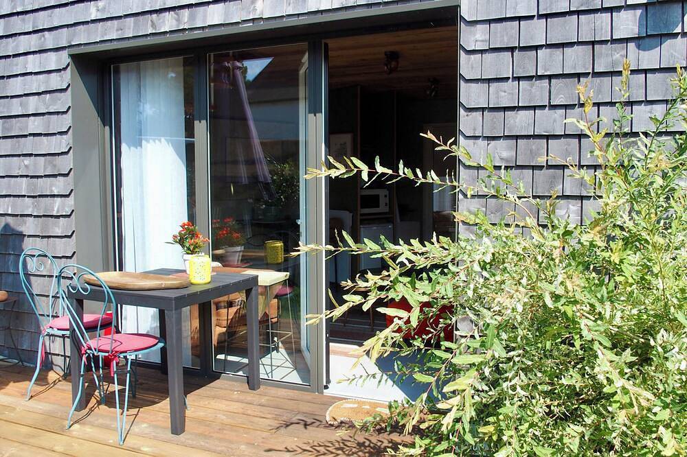 Apartamento entero, Small duplex with garden, near the charming port of Le Bono, pets welcome in Bono, Côte des Mégalithes