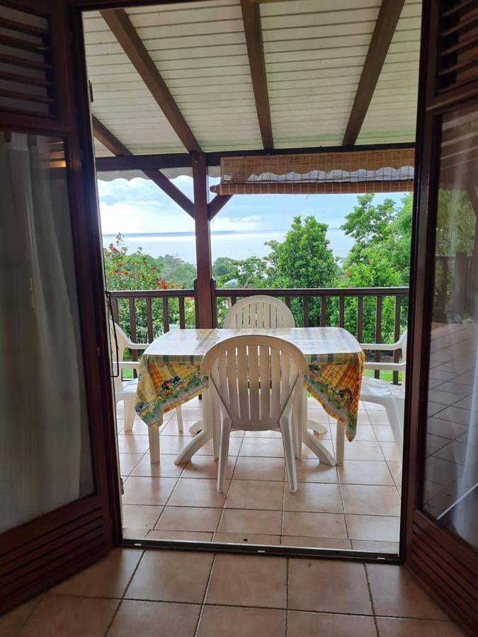 Appartement de vacances pour 4 personnes, avec vue ainsi que terrasse et jardin
