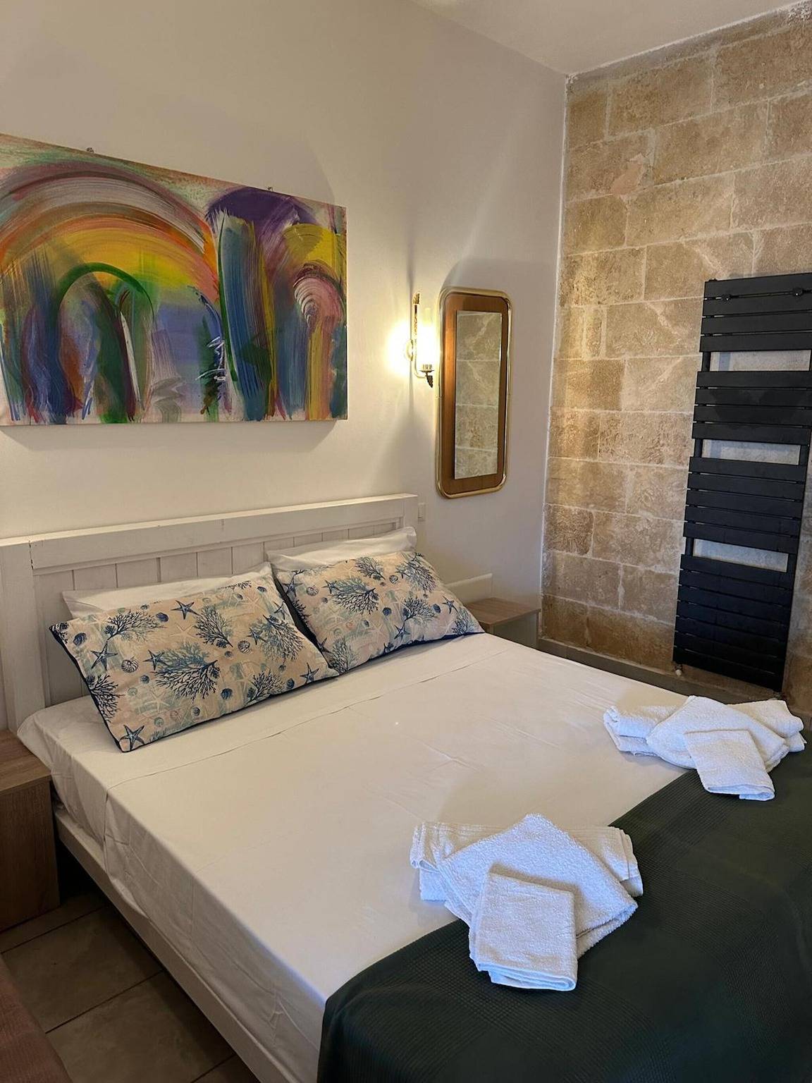 Chambre « Masseria Le Dimore, Stanza 3 » avec piscine partagée, Wi-Fi et climatisation in Baia Verde, Golfe de Tarente