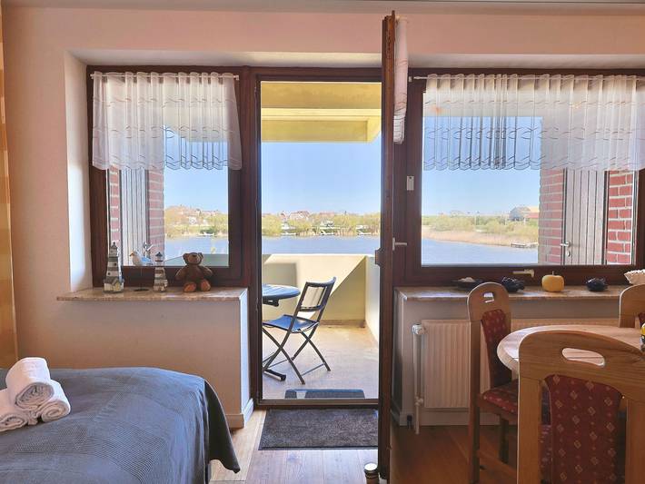 Ferienwohnung für 3 Personen, mit Balkon und Ausblick sowie Seeblick