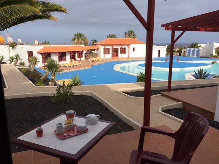 Bungalow para 3 personas, con jardín además de vistas y piscina en Caleta de Fuste