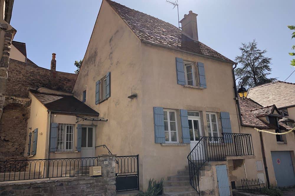 Pont Pinard building and its pink granite for 2 in Semur-en-Auxois, Montbard region