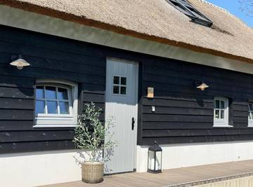 Ferienwohnung für 5 Personen, mit Terrasse und Garten sowie Ausblick in Westland