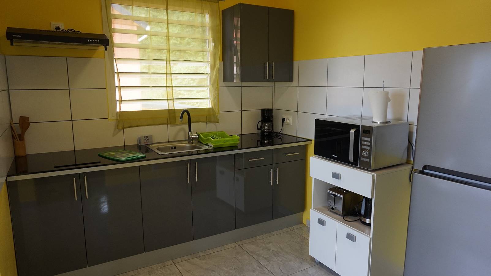 Appartement entier, Appartement charmant à Deshaies, piscine partagée, 46 m² in Deshaies, Guadeloupe