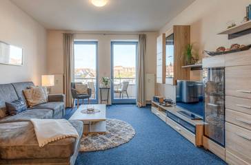 Ferienwohnung für 3 Personen, mit Balkon und Seeblick sowie Sauna in Waren (Müritz)