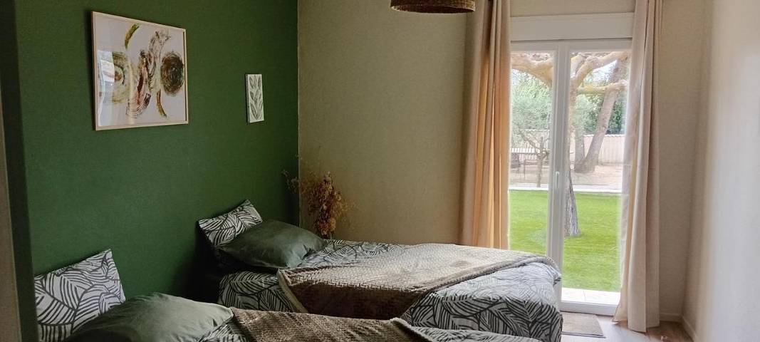 Appartement de vacances pour 2 personnes, avec piscine ainsi que jardin et vue