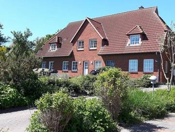 Ferienwohnung für 3 Personen, mit Terrasse und Garten sowie Seeblick in Holnis