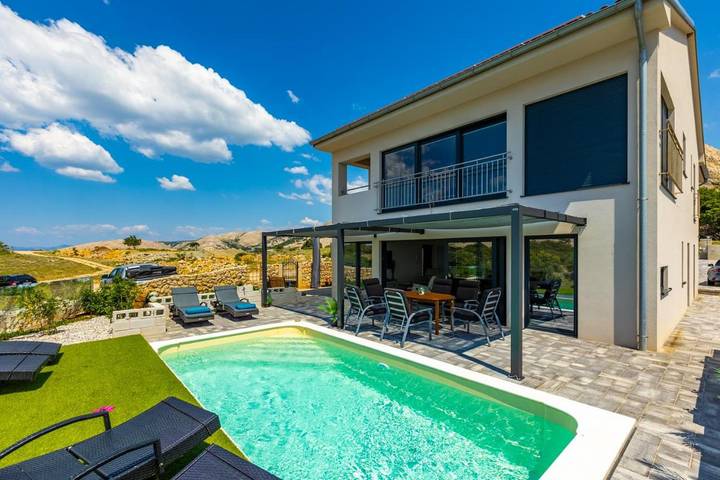 Ferienwohnung für 6 Personen, mit Ausblick und Pool sowie Seeblick und Garten, kinderfreundlich - 1