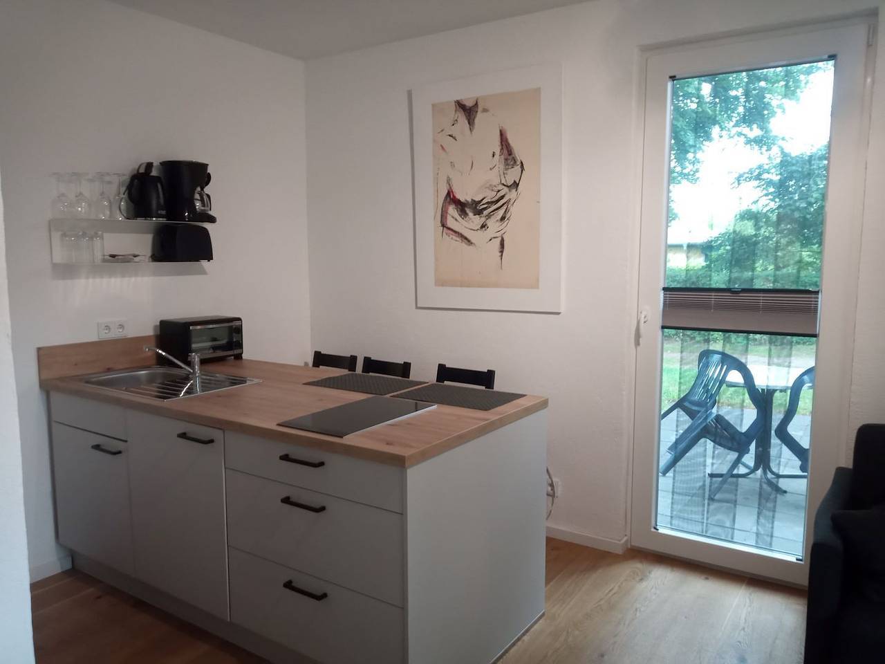 Ferienwohnung 2 – Achterwasser: Komfort mit Balkon, Terrasse & Blick aufs Wasser in Neeberg, Krummin