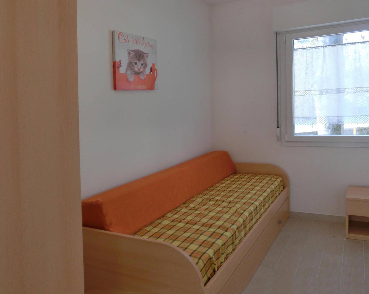 Gemütliche Villa: Strandnähe, AC, Parkplatz & Garten in Lignano Sabbiadoro, Udine Provinz
