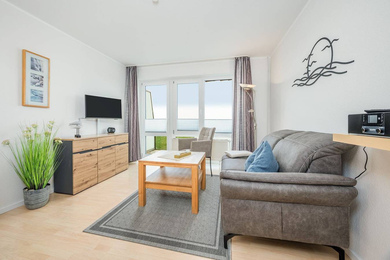 Ganze Wohnung, Hübsches Maisonette-Ferienapartment mit Balkon und tollem Blick zur Nordsee in Schillig Strand, Wangerland