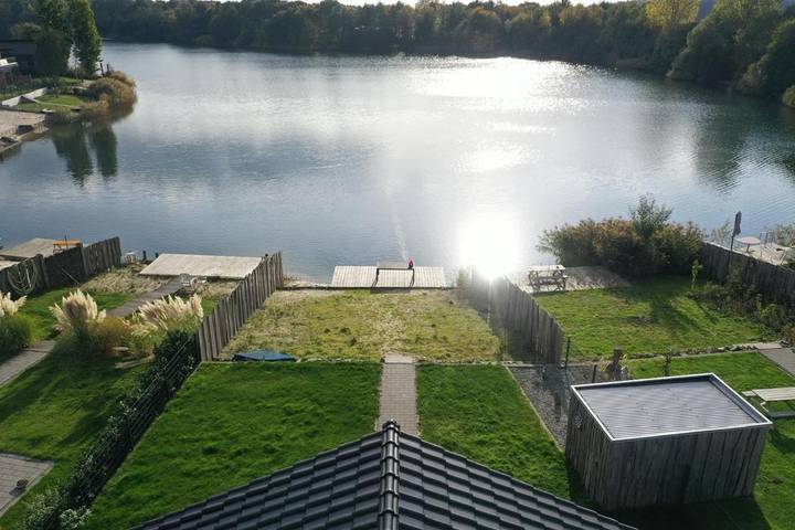 Ferienhaus für 6 Personen, mit Terrasse und Whirlpool sowie Garten und Seeblick in Barßel