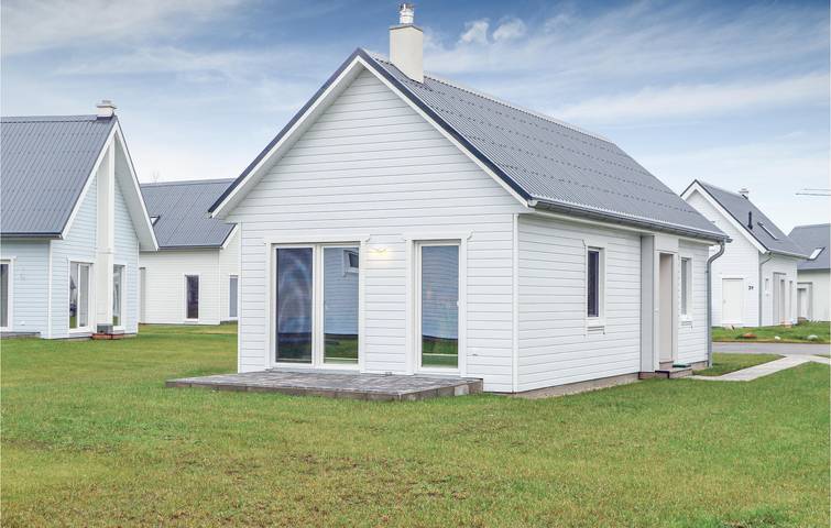 Ferienhaus für 4 Personen, mit Terrasse und Garten sowie Seeblick in Olpenitz
