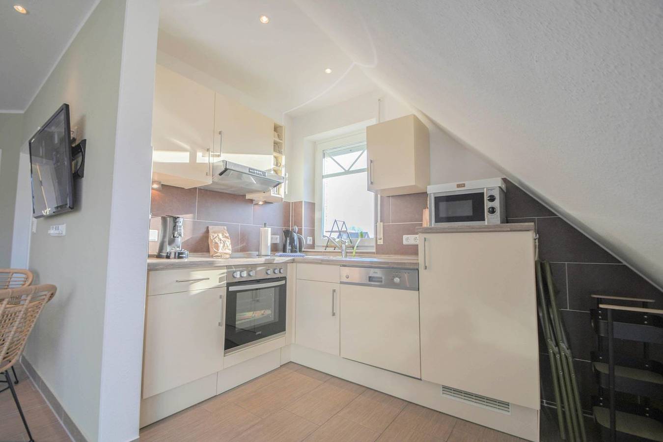 Ganze Wohnung, Modernes familienfreundliches Ferienhaus in Norddeich mit Balkon in Norddeich, Norden und Umgebung