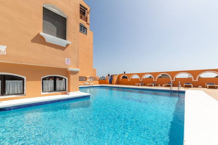 Apartamento entero, Apartamento "Residencial Fénix" con piscina compartida, terraza y Wi-Fi in Buena Vista Roquetas de Mar, Roquetas de Mar