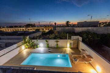 Location de vacances pour 4 personnes, avec balcon/terrasse à Marina di Mancaversa