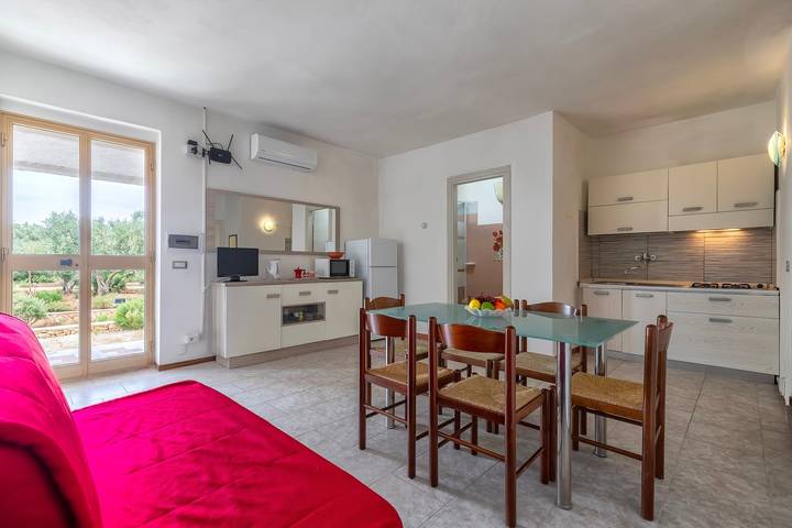 Apartamento entero, Apartamento 'Trilocale Ginepro Vista Mare 2' con vistas al mar, Wi-Fi y aire acondicionado in La Muddizza, Valledoria