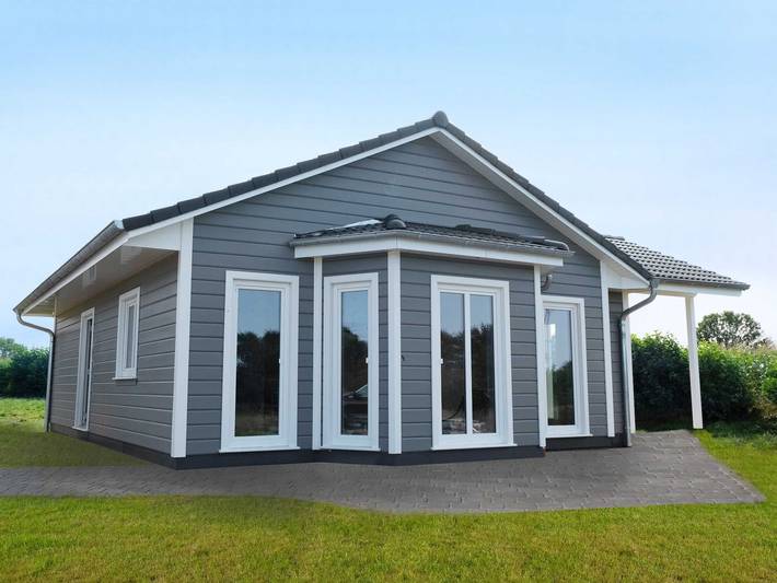 Ferienhaus für 4 Personen, mit Terrasse und Garten sowie Ausblick, mit Haustier in Wackerballig