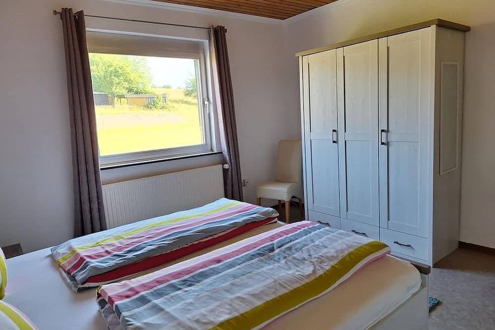 Ganze Wohnung, Haus Weiherfeld - Ferienwohnung mit 2 Schlafzimmern in Tholey, Saar-Nahe-Bergland