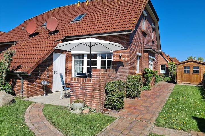 Ferienhaus für 4 Personen, mit Terrasse und Garten in Dornum