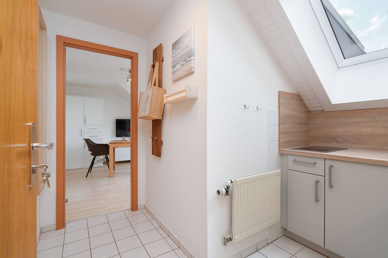 Ganze Wohnung, Gemütliche Dachgeschoss-Wohnung mit kleinem Balkon und Meerblick in Pelzerhaken in Südstrand Pelzerhaken, Ostholstein