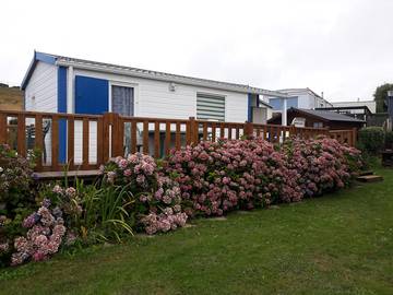 Mobil home pour 4 personnes, avec terrasse ainsi que jardin et piscine dans Plage D Equihen Equihen Plage