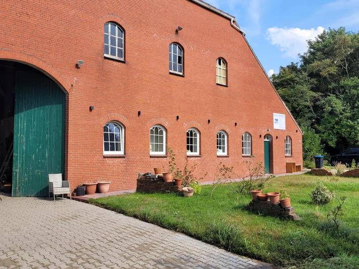Ferienwohnung für 2 Personen, mit Terrasse und Garten sowie Ausblick in Manslagt